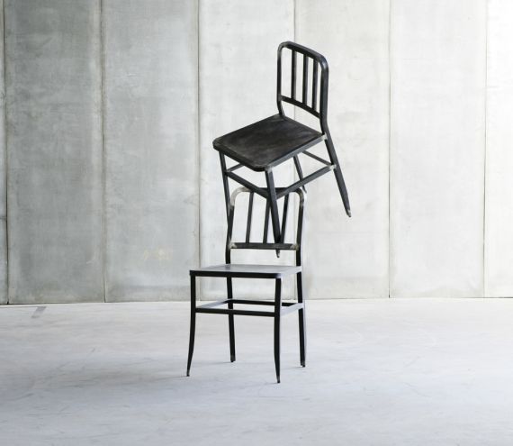 Metal Chair with leather seat by Heerenhuis