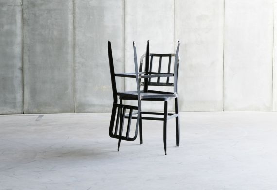 Metal Chair with leather seat by Heerenhuis