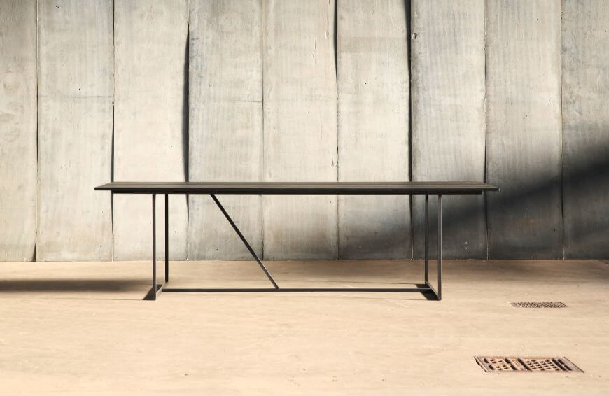 Mesa Nero - a table in distressed French oak by Heerenhuis at Different Like a Zoo