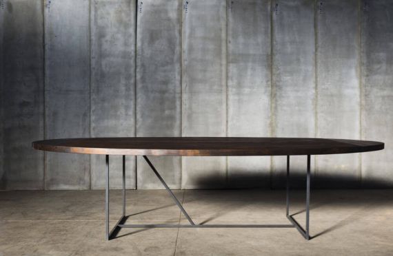 Mesa OV table with reclaimed teak top and charcoal finish over a solid metal base by Heerenhuis
