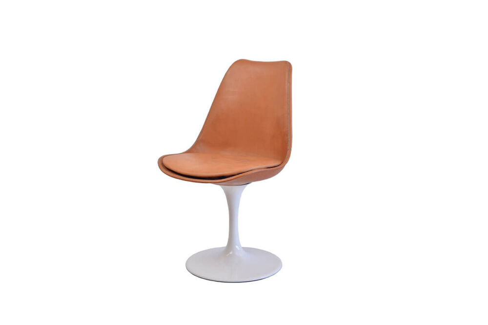 Revolving dining chair in natural leather with white swivel base by Sol & Luna