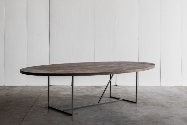 Mesa OV table by Heerenhuis: an oval table in reclaimed teak with charcoal finish