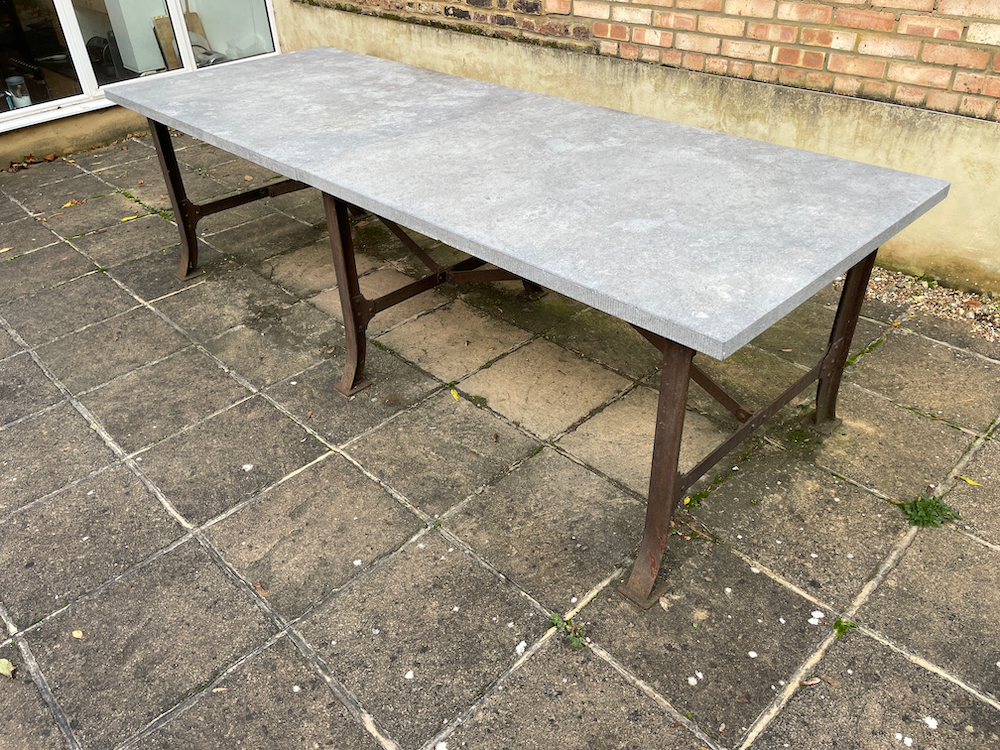 Bluestone outdoor table by Heerenhuis: set over a metal base
